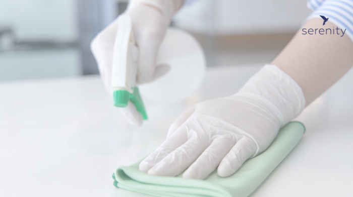 Illustration of the three stages of cleaning and disinfecting a surface for hygiene and safety