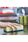 Caterers Sponge Scourer being used for cleaning surfaces.