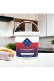 Serenity Antimicrobial Kitchen Wipes tub in a kitchen setting, effective for sanitizing surfaces.